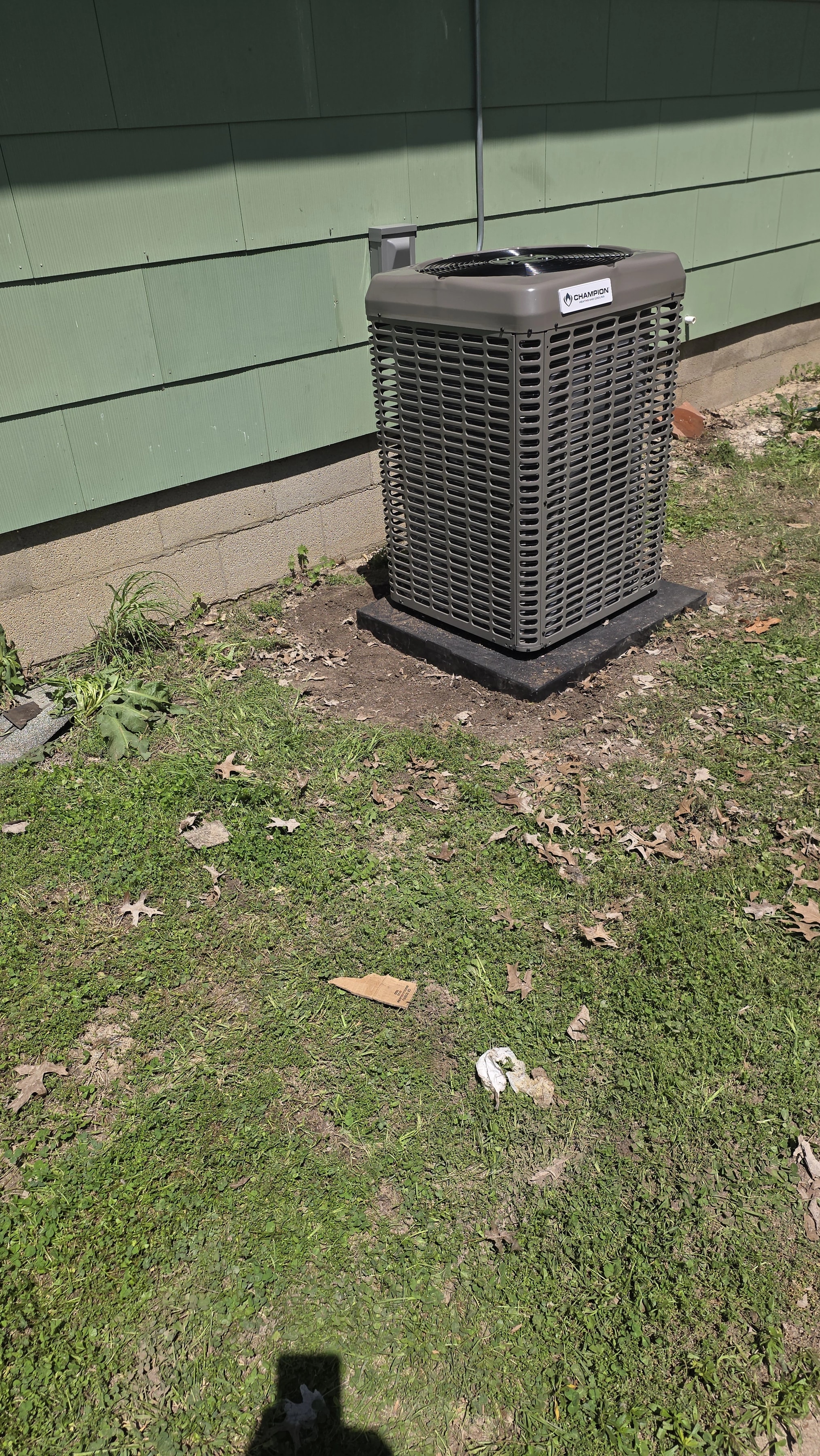 Outdoor AC equipment beside a home
